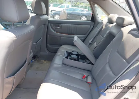 2003 Toyota Avalon Xls z USA, uszkodzony, nr VIN 4T1BF28B13U294364